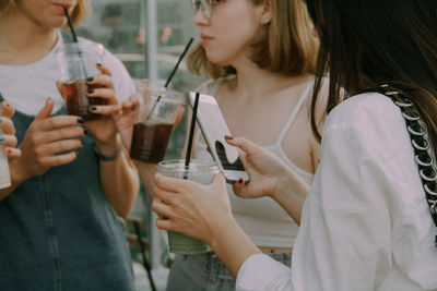 Group of people in drinking glass