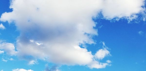 Low angle view of clouds in blue sky