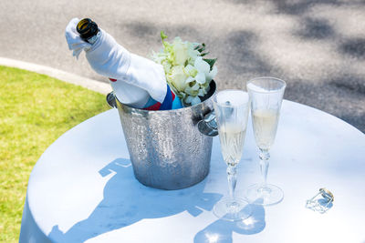 Close-up of white wine bottles on table