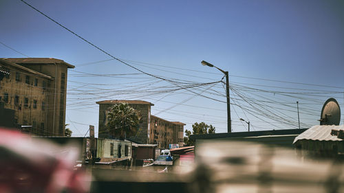 Low angle view of buildings against clear sky