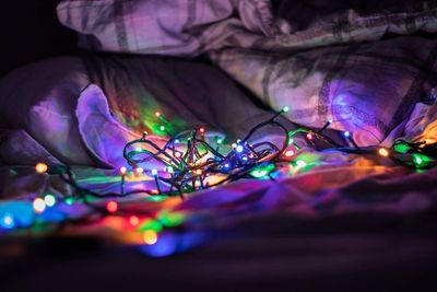 Close-up of illuminated lighting equipment