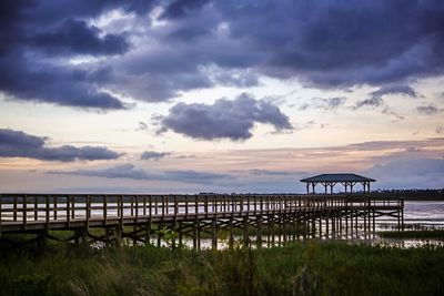 Scenic view of landscape against cloudy sky