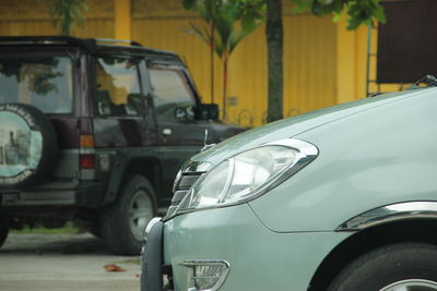 View of cars parked on street