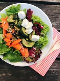 High angle view of chopped vegetables in bowl on table