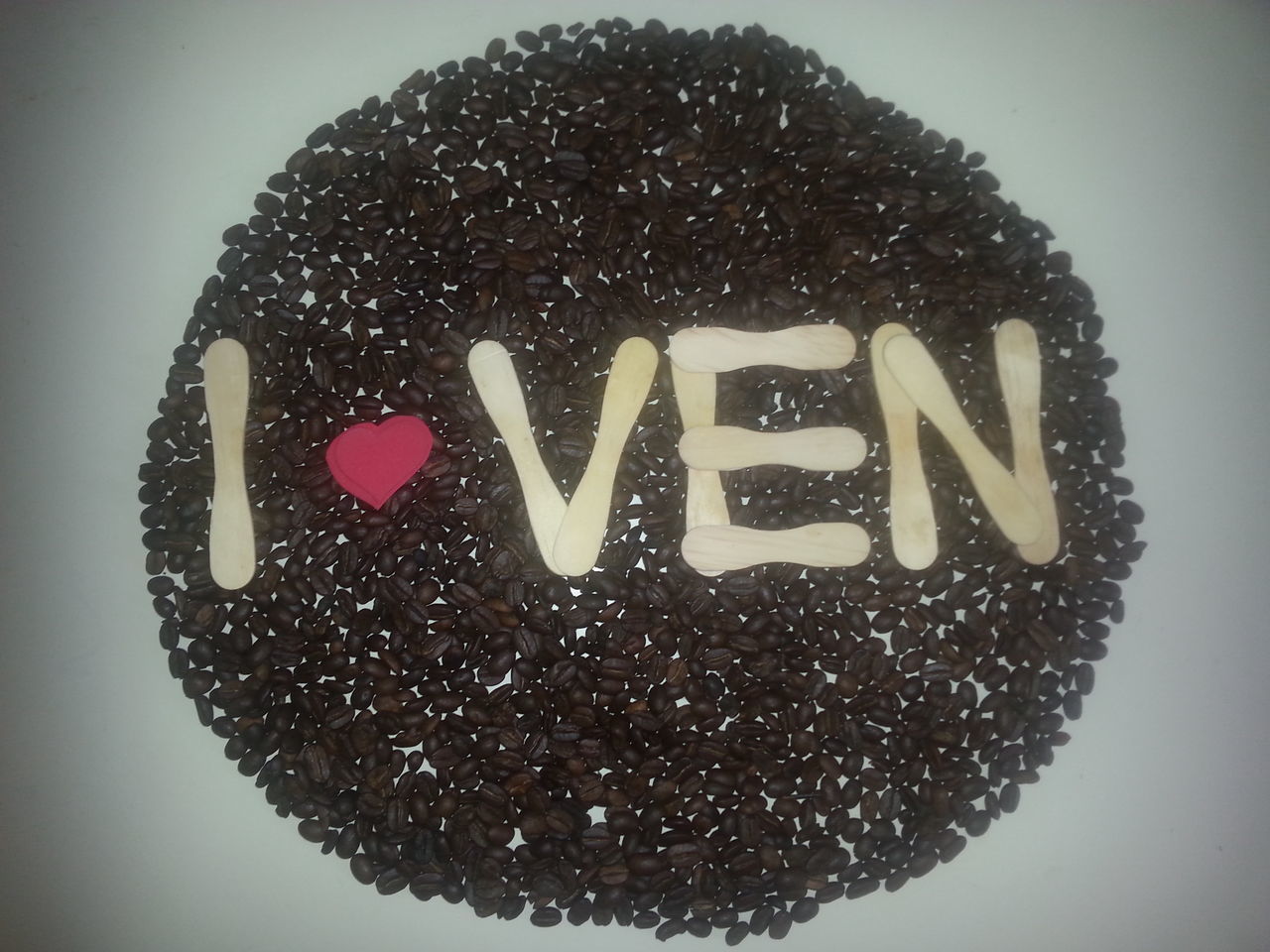 CLOSE-UP OF HEART SHAPE CAKE ON PLATE