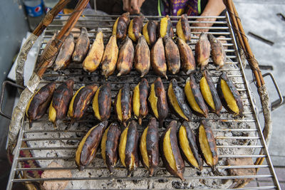 High angle view of seafood on barbecue grill