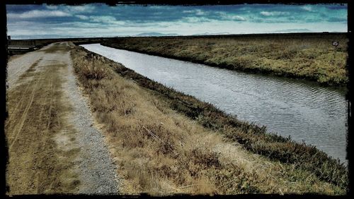 View of footpath by sea