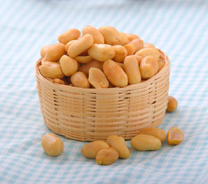 Close-up of fruits in basket on table