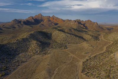 Scenic view of desert against sky