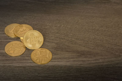 High angle view of coins on table