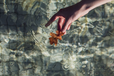 Reflection of person in water