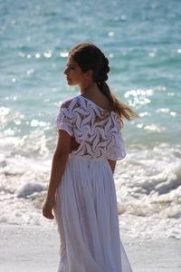 Woman standing at beach