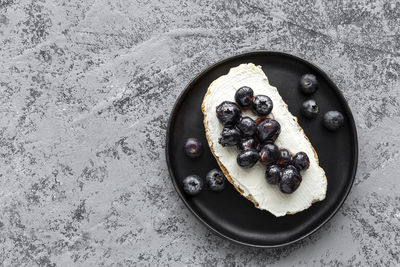 High angle view of breakfast on cake