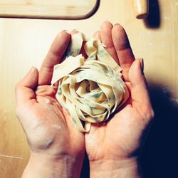 Close-up of person holding hands