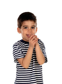 Cute boy standing against white background