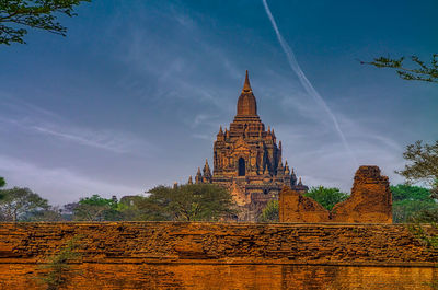 View of temple building against sky