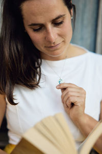 Close-up of woman holding hands