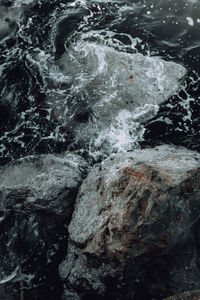 Full frame shot of rocks in sea