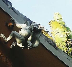 Low angle view of statue against clear sky