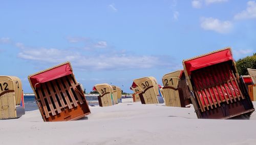 Seats on sand at beach