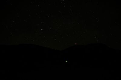 Scenic view of star field against sky at night