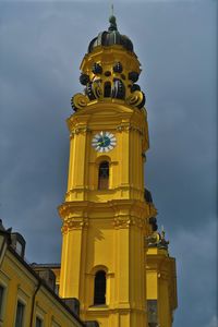 Low angle view of bell tower against sky