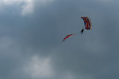 Low angle view of kite flying in sky