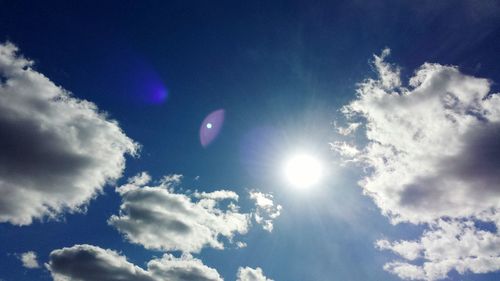 Sun shining through clouds