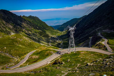 High angle view of road amidst mountains against sky