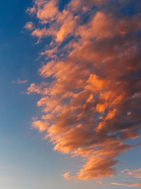Low angle view of dramatic sky during sunset