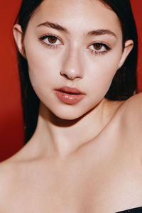 Close-up portrait of young woman