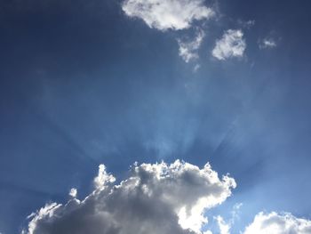 Low angle view of clouds in blue sky