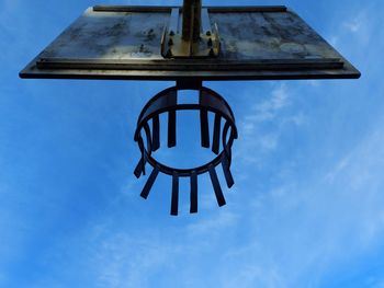 Low angle view of basketball hoop against sky