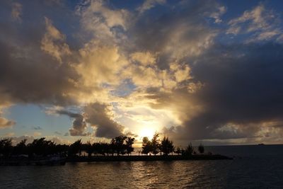 Scenic view of sea against sky at sunset