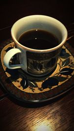 Close-up of coffee cup on table