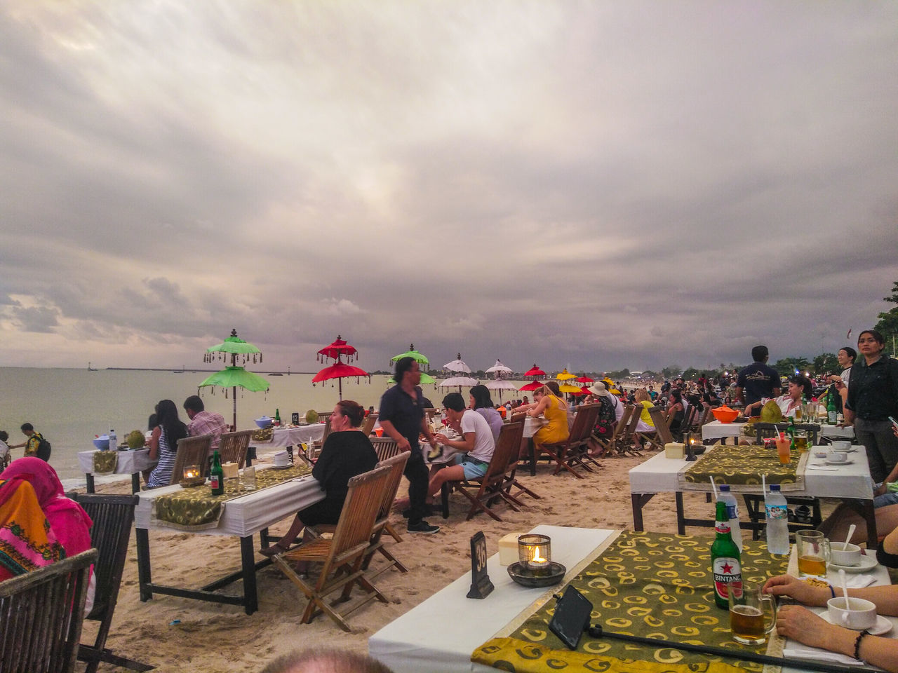 sky, party - social event, celebration, large group of people, sea, cloud - sky, sunset, beach, outdoors, scenics, people, adult, nature, young adult, day, adults only