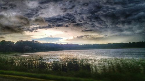 Reflection of clouds in calm lake