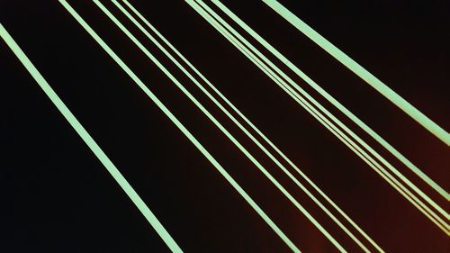 Close-up of light trails against black background