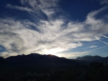 Scenic view of silhouette mountain against sky