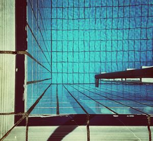 Close-up of swimming pool against blue sky