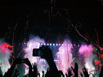 People photographing at night