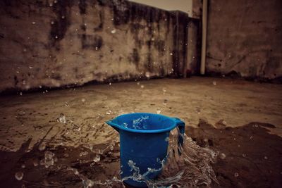 Garbage can in abandoned building