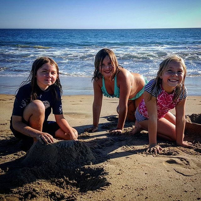 togetherness, bonding, person, lifestyles, leisure activity, beach, love, smiling, sea, looking at camera, happiness, water, young adult, vacations, portrait, young women, family, friendship