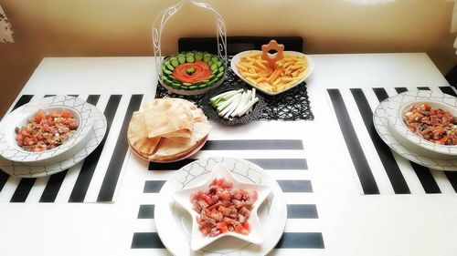 High angle view of food served on table