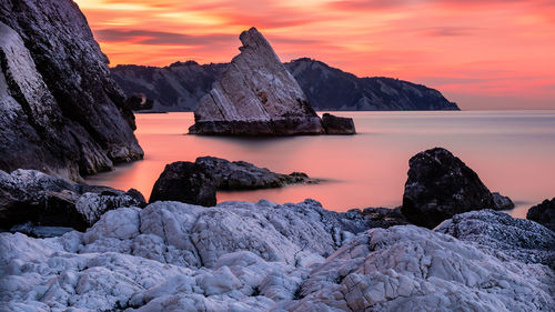 Scenic view of sea against sky during sunset