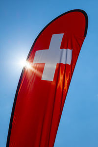 Low angle view of flag against clear sky