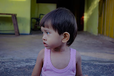 Portrait of cute girl looking away