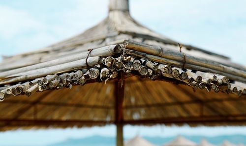 Low angle view of roof against sky