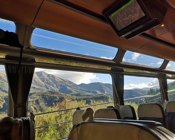 Scenic view of landscape seen through train window