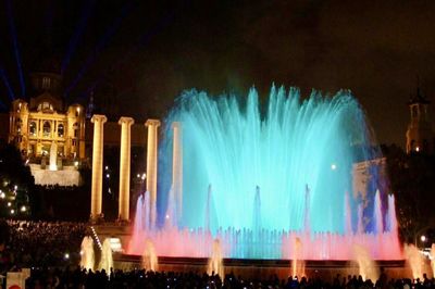 Panoramic view of illuminated buildings at night